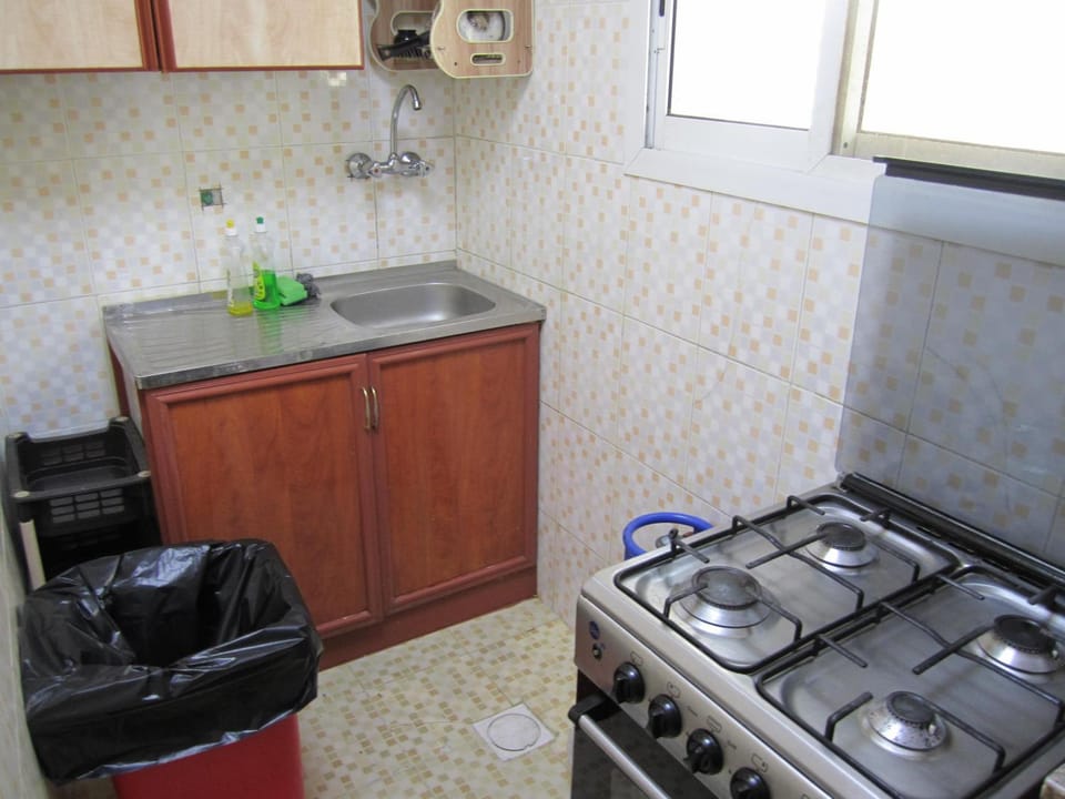 Kitchen or kitchenette, stove