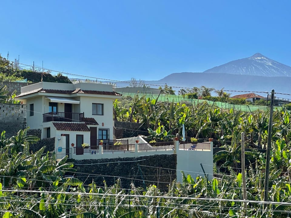 Property building, Neighbourhood, Natural landscape, Mountain view