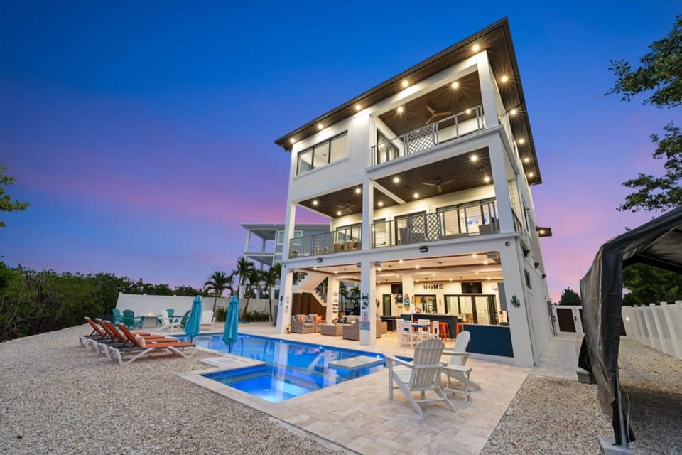 Luxury Seaside Escape ~ Heated Pool w Jacuzzi ~ Elevator ~ Dock ~ Scenic Views House in Key Colony Beach