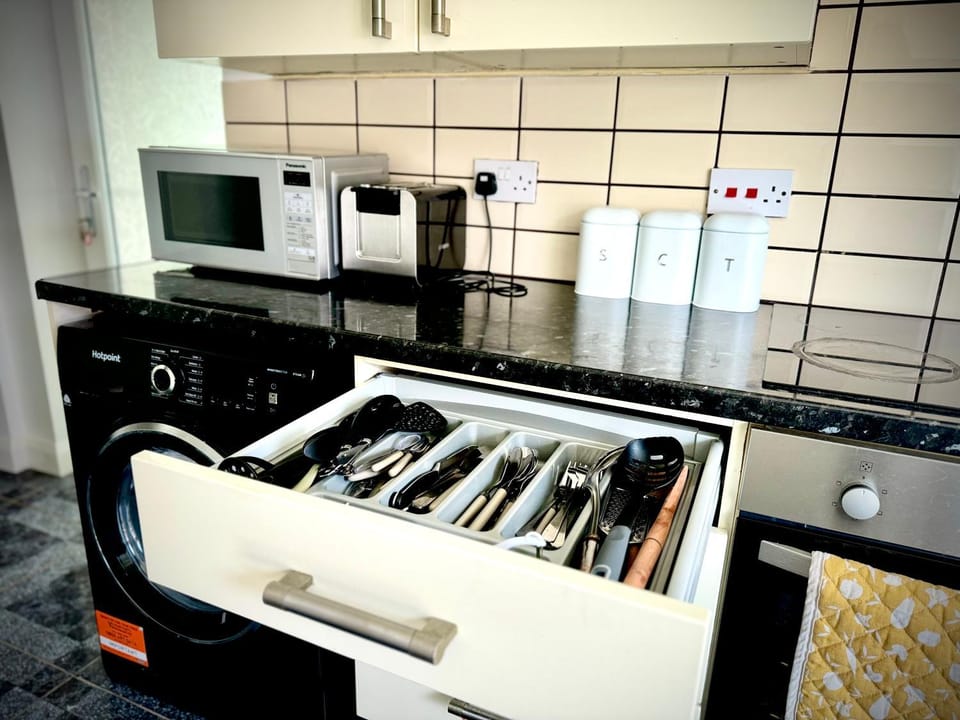Kitchen or kitchenette, microwave