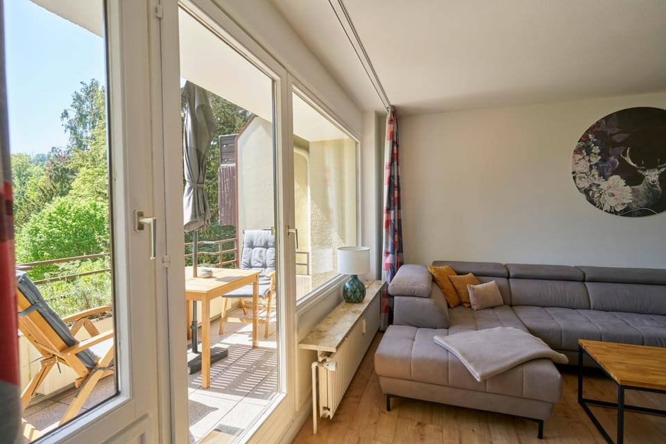 View (from property/room), Balcony/Terrace, Living room, Seating area, Garden view