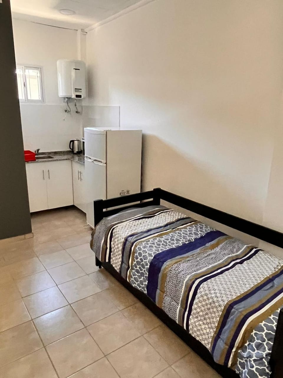 Bed, Kitchen or kitchenette, stove