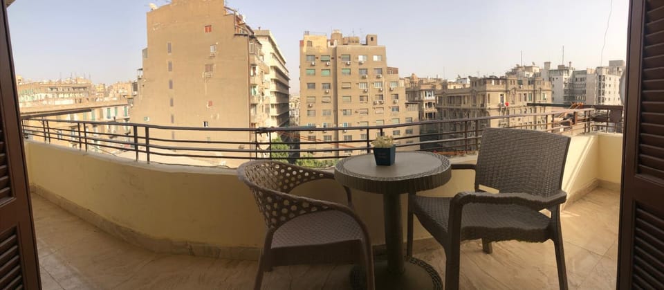 Property building, Patio, Day, View (from property/room), Balcony/Terrace, Seating area, Dining area, City view