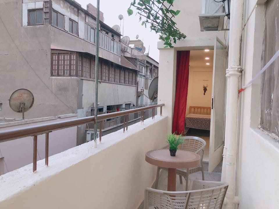 Property building, Patio, Day, View (from property/room), Balcony/Terrace, Living room, Seating area, Dining area