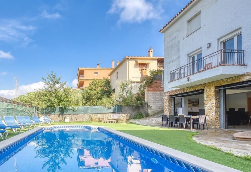 Property building, Living room, Swimming pool