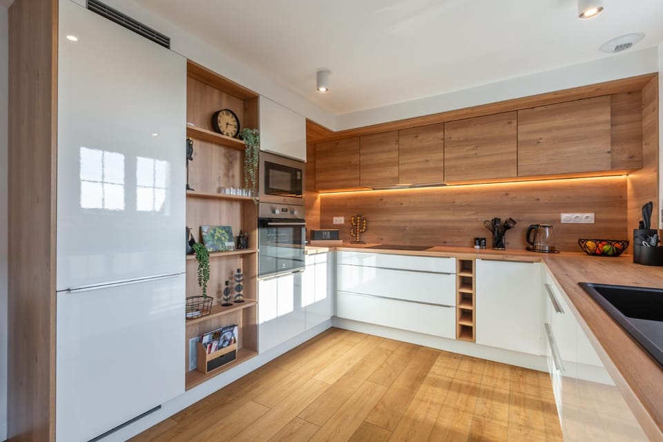 Kitchen or kitchenette, dishwasher, oven, stove