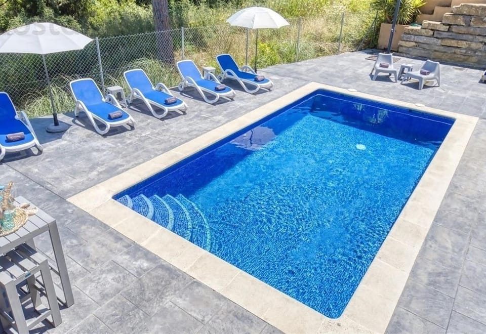 Property building, Living room, Swimming pool