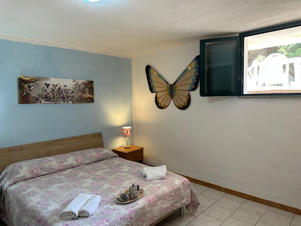 Appartamenti Magnolie-La pineta A SOLI 100 m DALLA SPIAGGIA Apartment in Sardinia