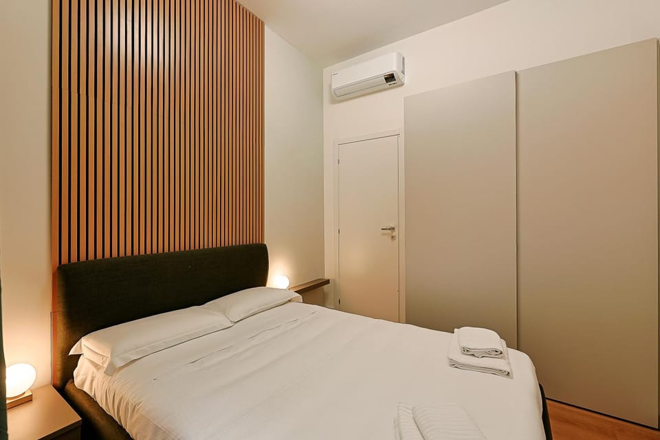 Bed, Bedroom, towels, wardrobe, air conditioner