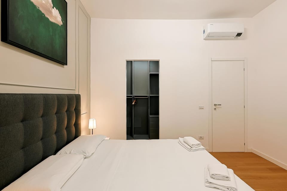 Bed, Decorative detail, Bedroom, locker, towels, wardrobe, air conditioner