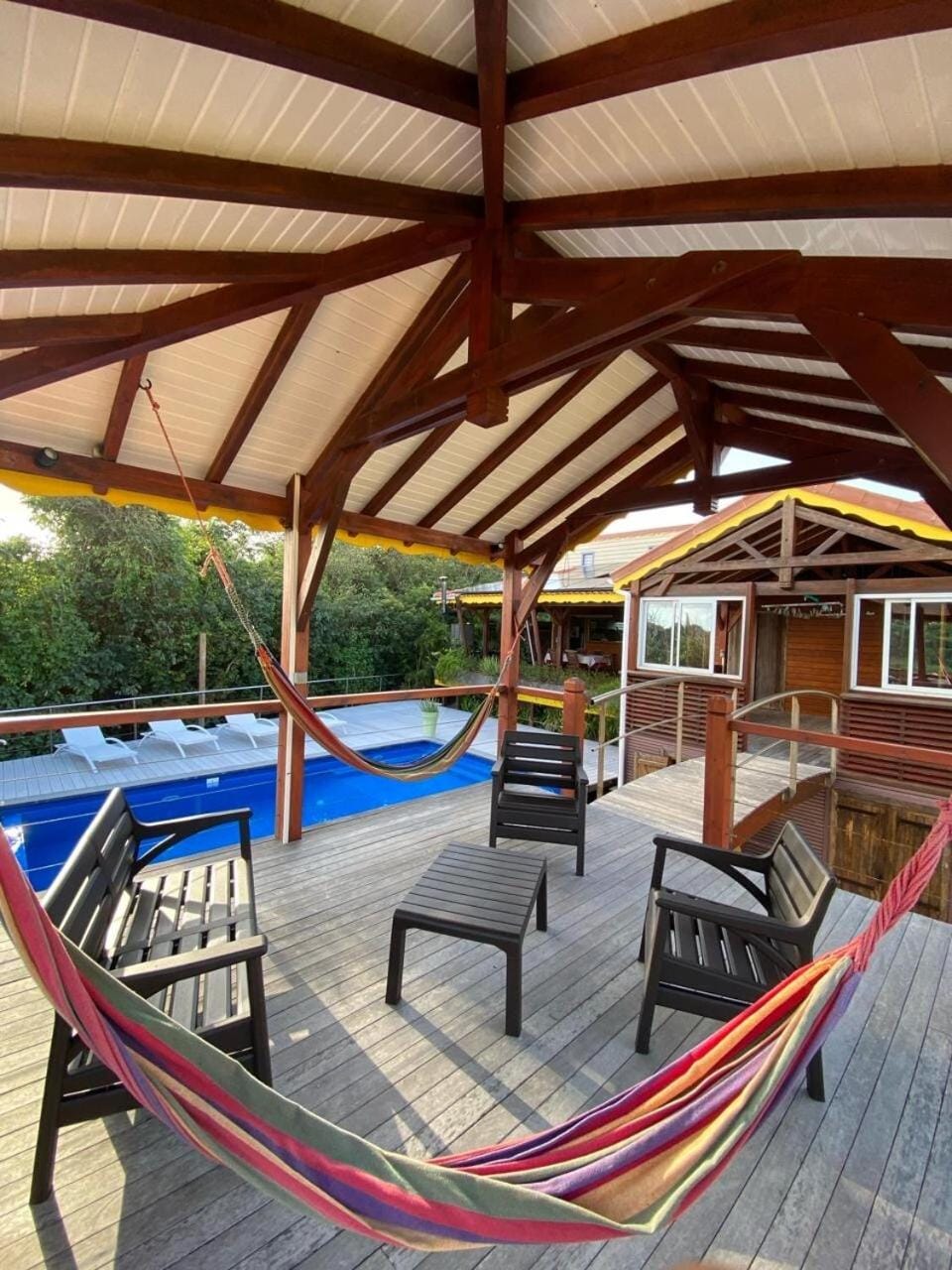 Patio, Day, Natural landscape, Pool view, Swimming pool, sunbed