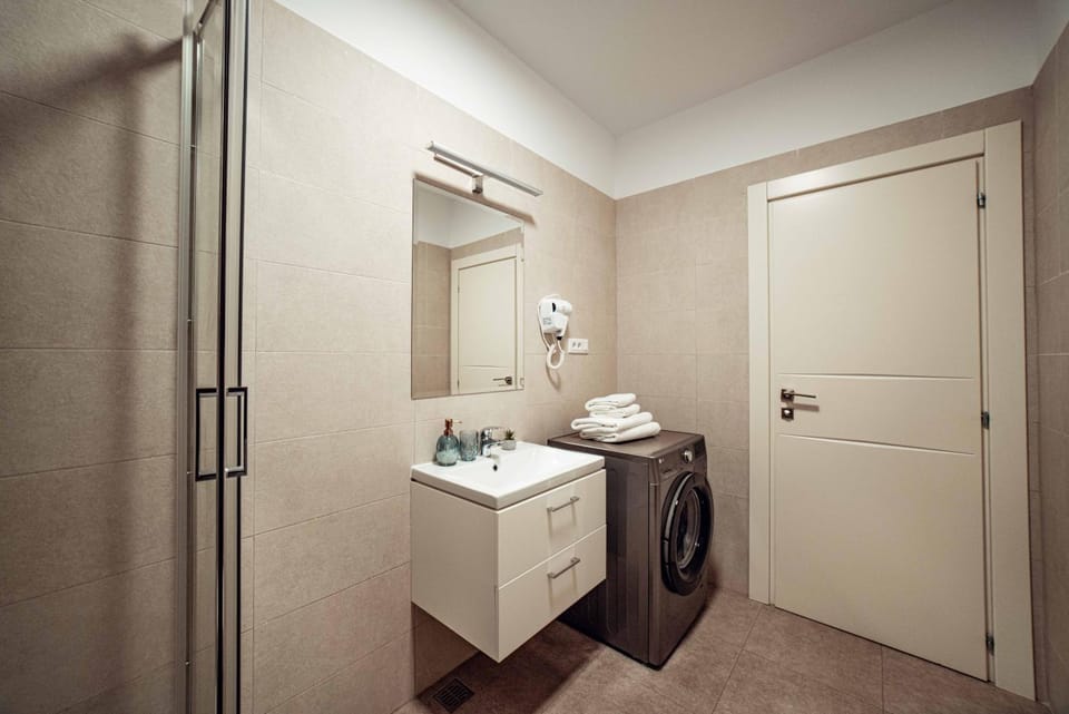 Bathroom, towels, washing machine, dryer