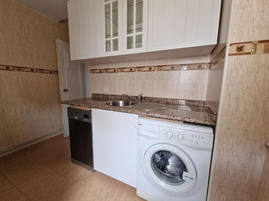 Kitchen or kitchenette, dishwasher, washing machine