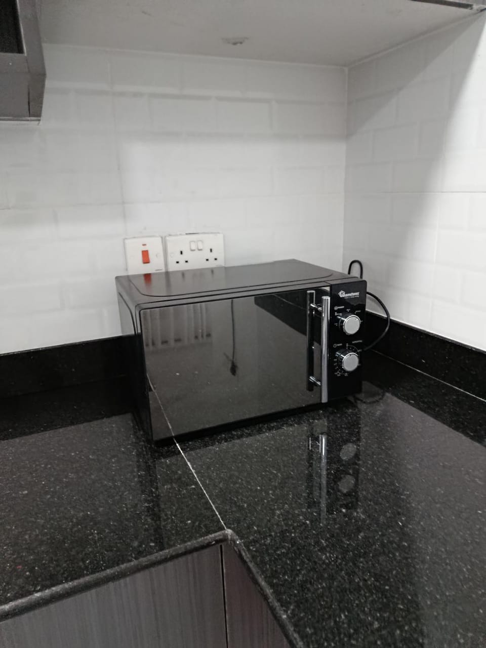 Kitchen or kitchenette, microwave