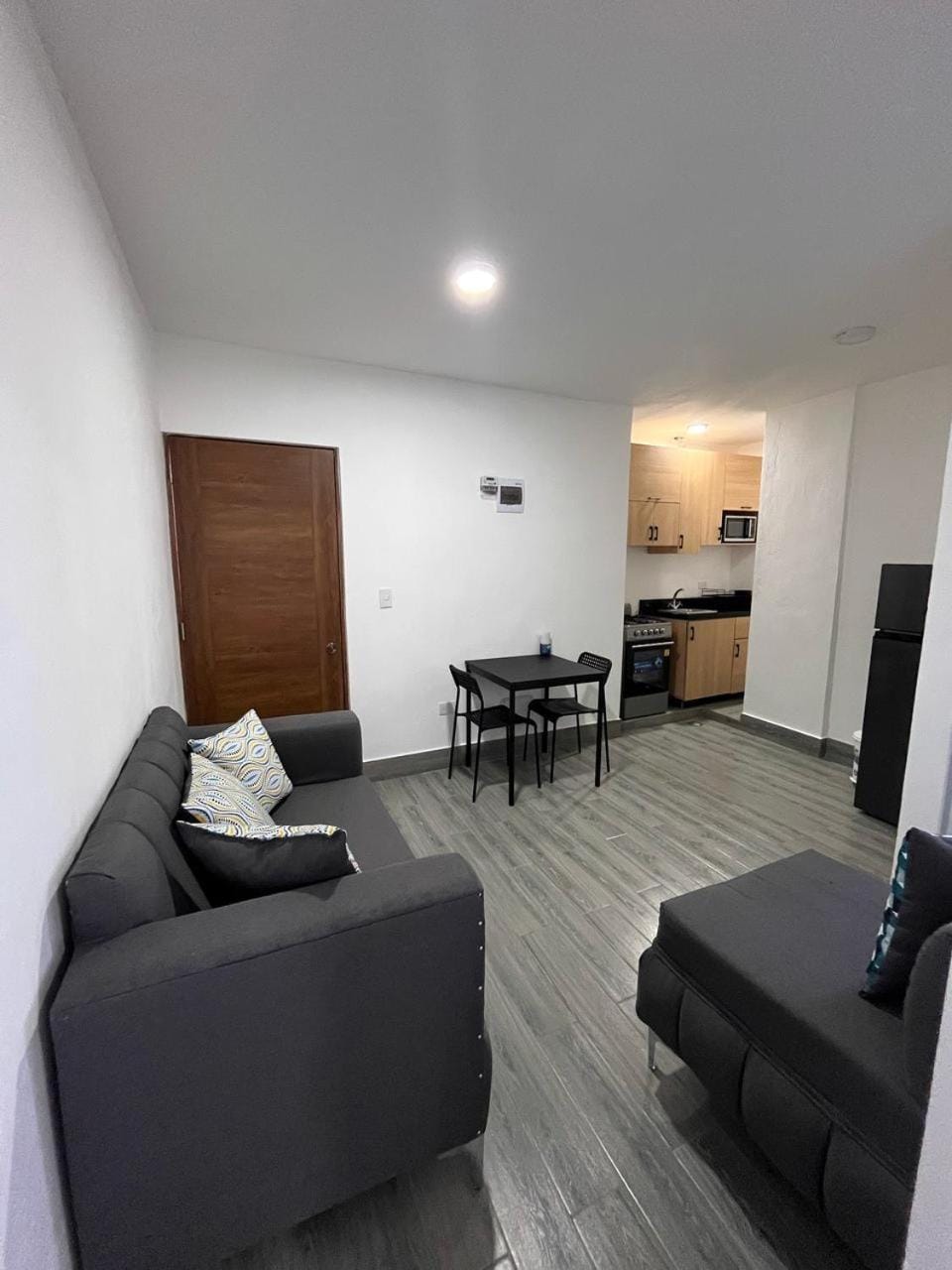 Kitchen or kitchenette, Living room, oven, stove