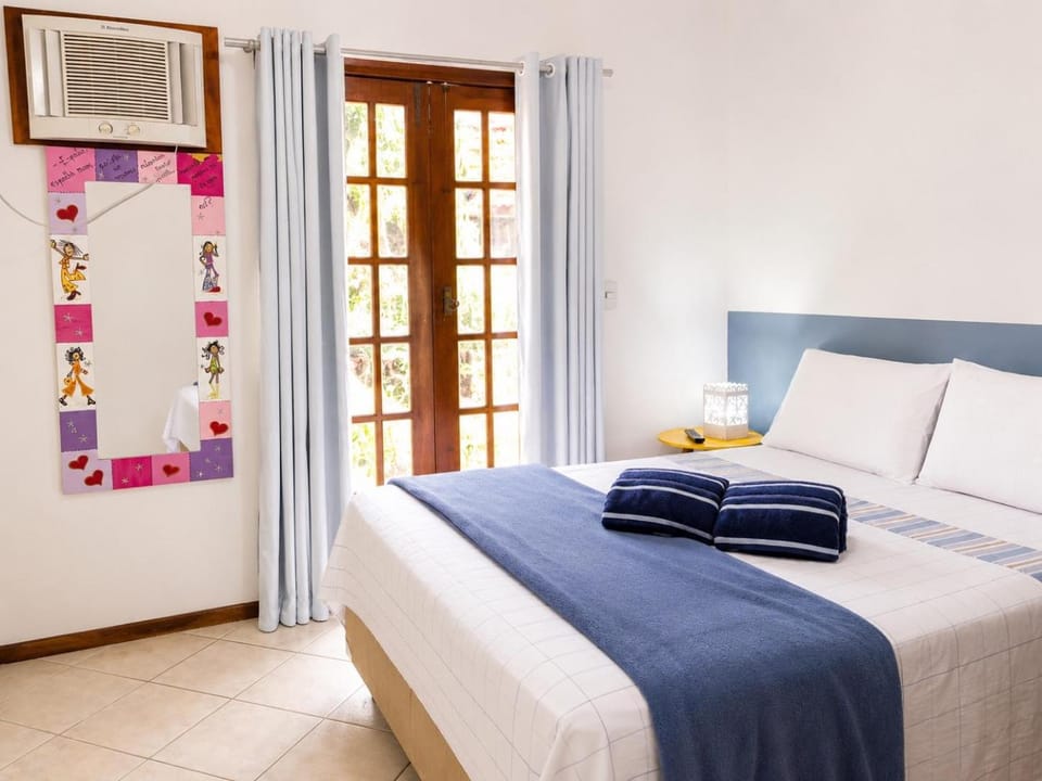 Bed, Photo of the whole room, Bedroom, towels, air conditioner