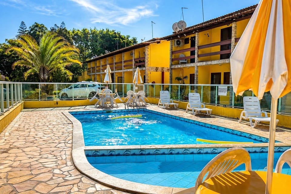 Property building, Day, Pool view, Swimming pool, sunbed