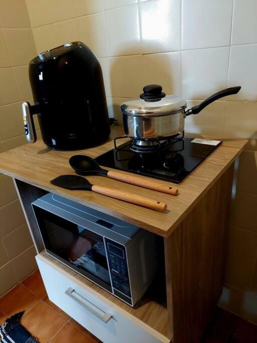 Kitchen or kitchenette, stove
