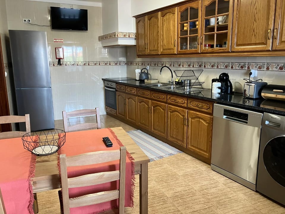 dishwasher, flat iron, microwave, oven, stove, toaster, washing machine, kitchen