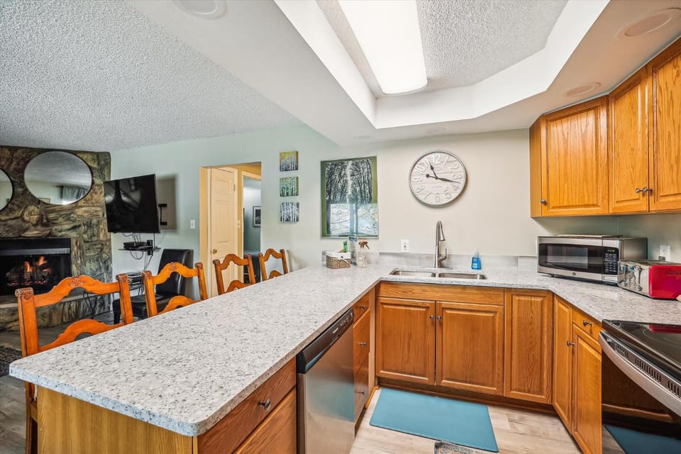 Kitchen or kitchenette, Dining area, dishwasher, oven, stove, toaster