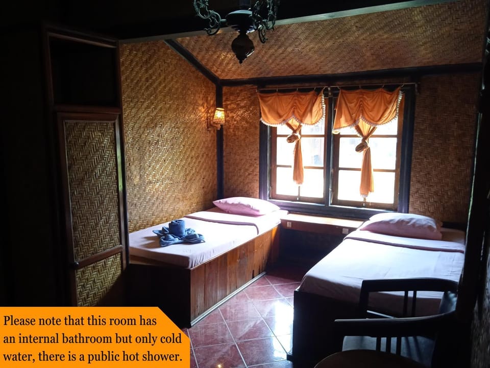 Property building, Bed, Photo of the whole room, Bedroom, Text overlay, Guests, towels