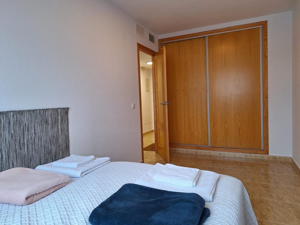 Bedroom, towels, wardrobe