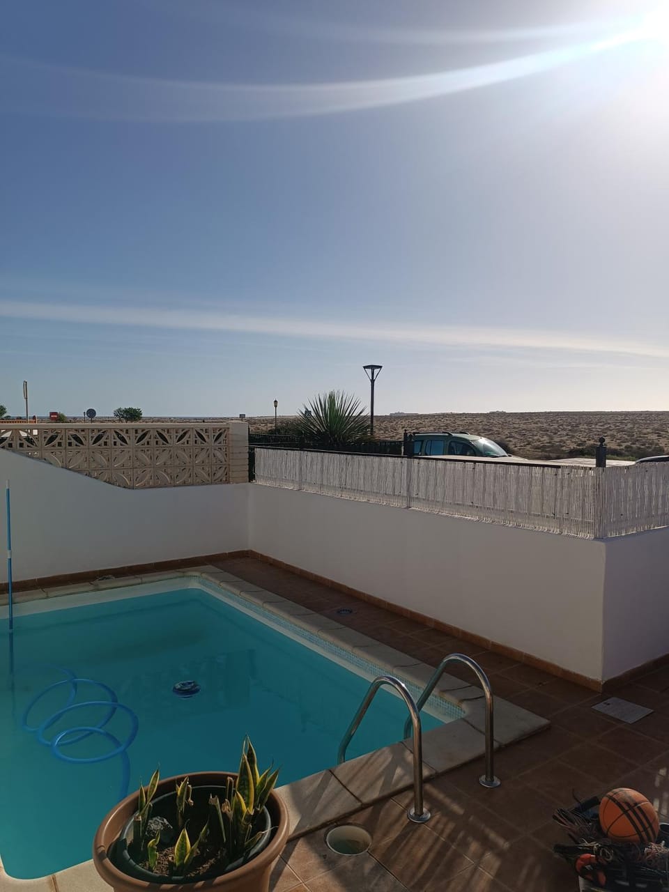 Swimming pool, sunbed