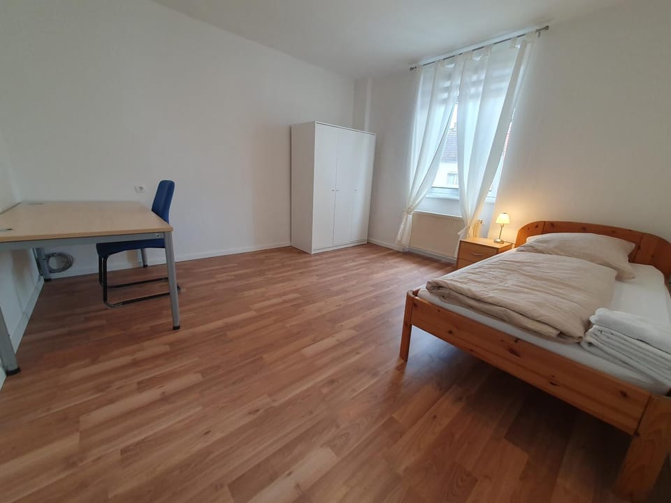 Property building, Bed, Photo of the whole room, Seating area, Dining area, Bedroom, Communal kitchen, furniture, hair dresser, heating, internet, internet, internet, locker, locker, soundproof, towels, towels, wardrobe, washing machine