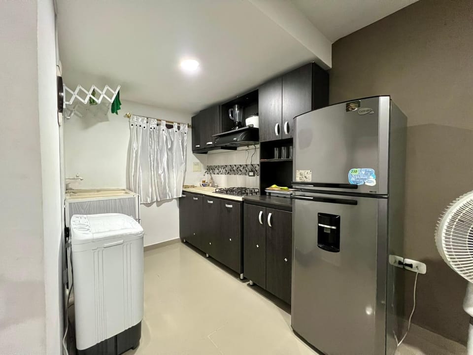 Kitchen or kitchenette, washing machine