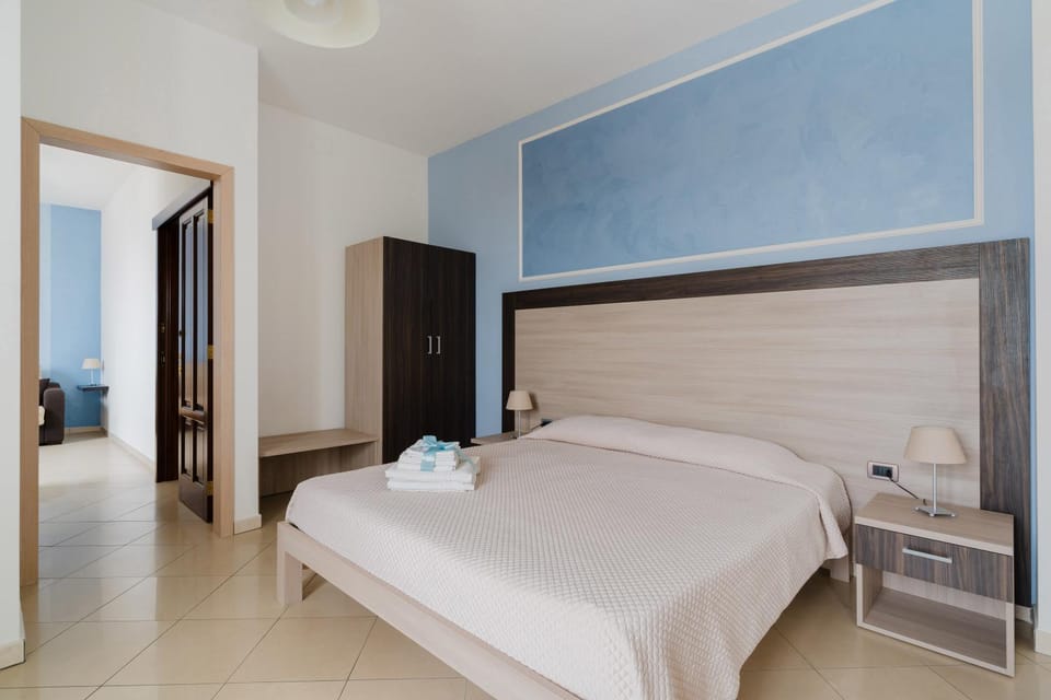 Bed, Photo of the whole room, Bedroom, towels, wardrobe