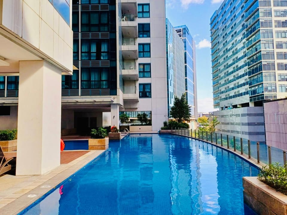 Property building, Day, Pool view, Swimming pool