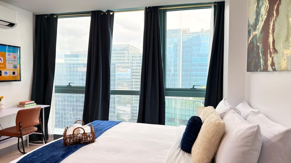 Bed, View (from property/room), Decorative detail, Bedroom, City view, air conditioner