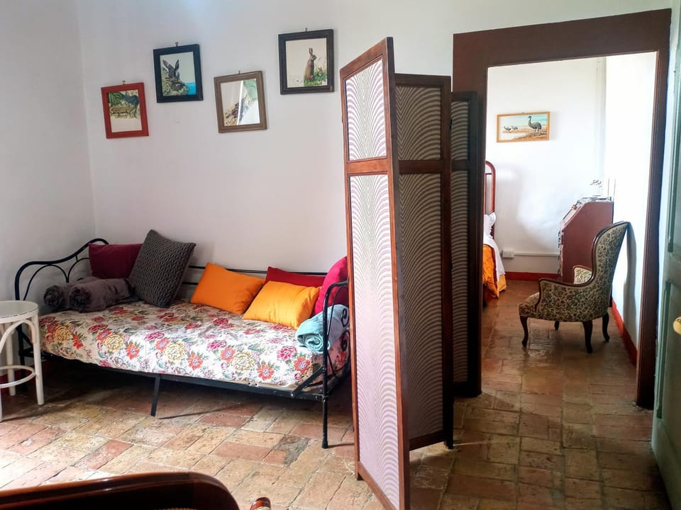 Bed, Seating area, Bedroom