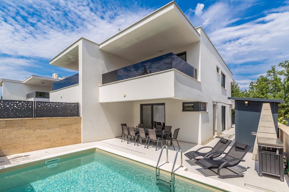 Property building, Seating area, Swimming pool, sunbed