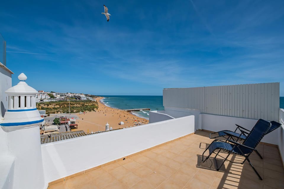 Patio, Nearby landmark, Natural landscape, View (from property/room), Beach, Sea view, sunbed
