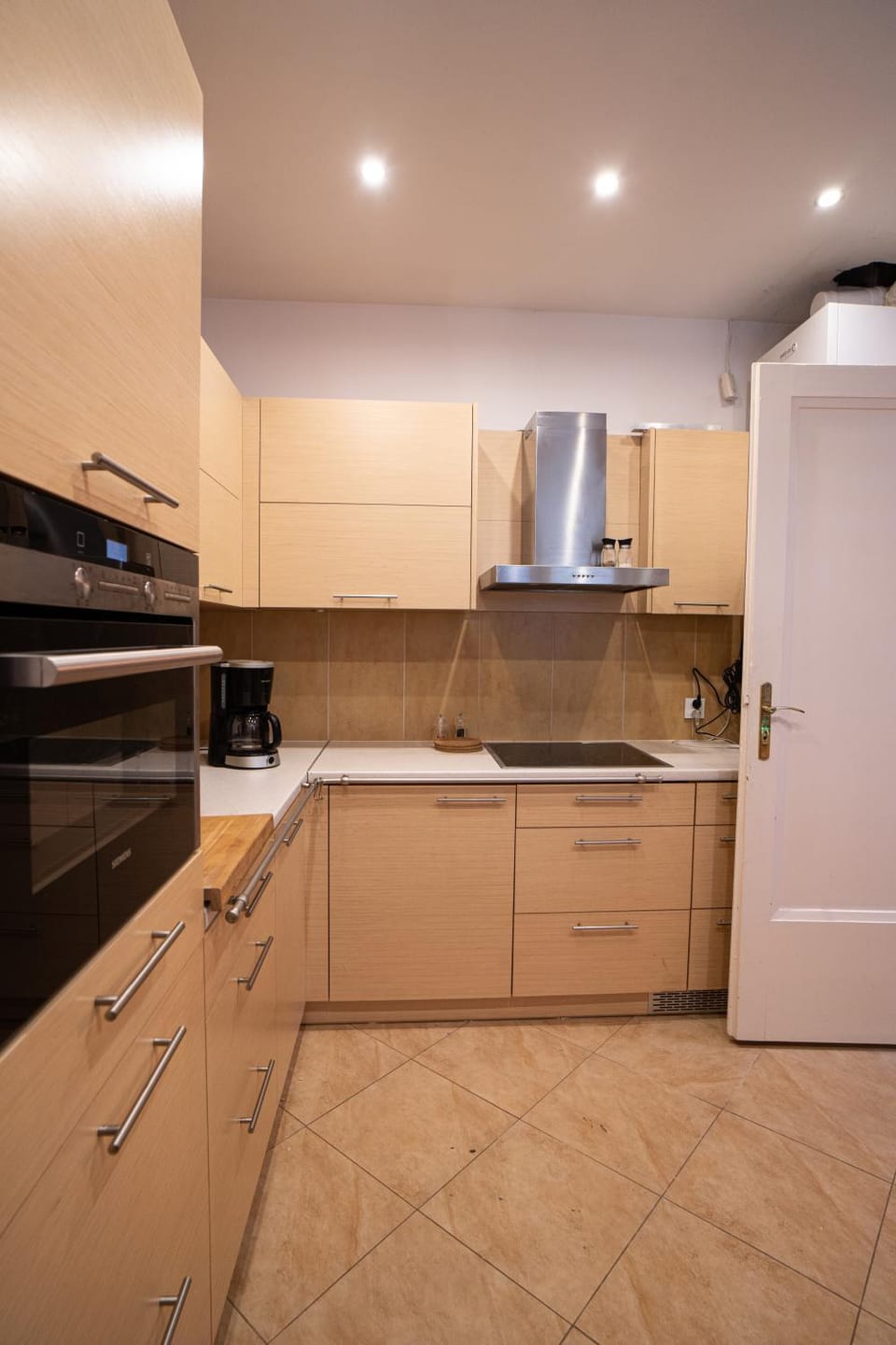Kitchen or kitchenette, dishwasher, oven, stove