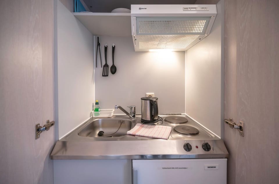 Kitchen or kitchenette, stove