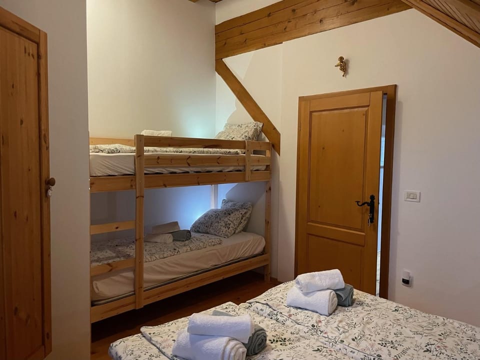 Bed, Bedroom, bunk bed, towels, wardrobe