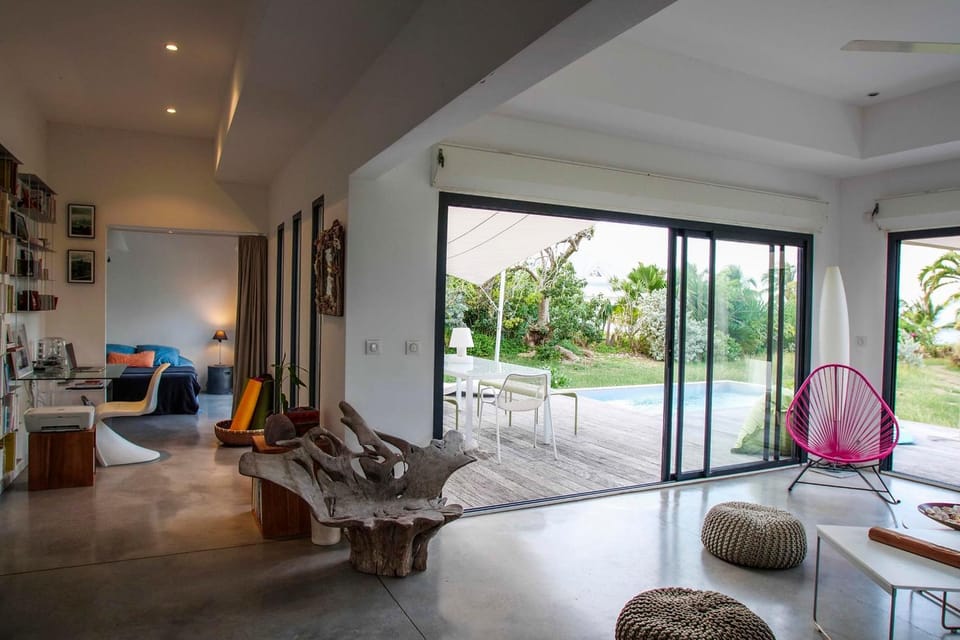 Patio, Natural landscape, Garden, Living room, Seating area, Garden view, Pool view, Swimming pool, sunbed