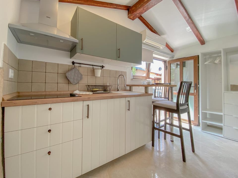 Kitchen or kitchenette, stove