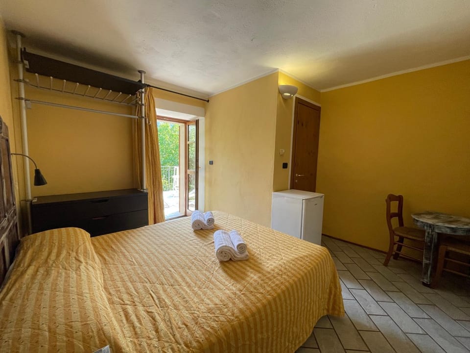 Bed, Photo of the whole room, Bedroom, towels, wardrobe
