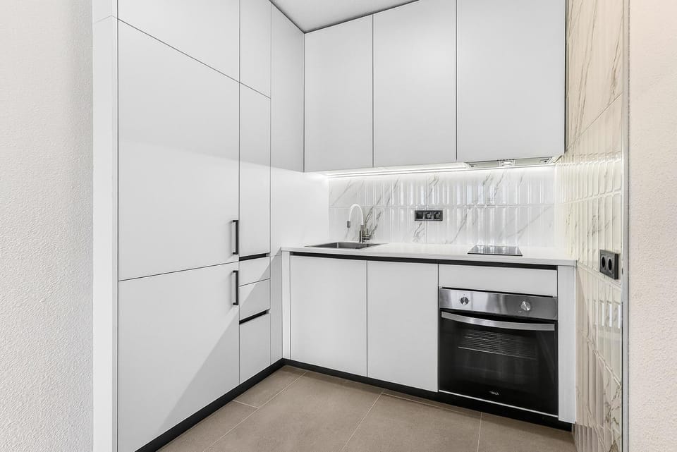 Kitchen or kitchenette, oven, stove