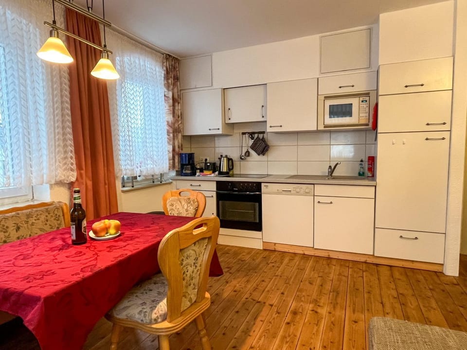 Kitchen or kitchenette, Seating area, Dining area, dishwasher, oven, stove, toaster