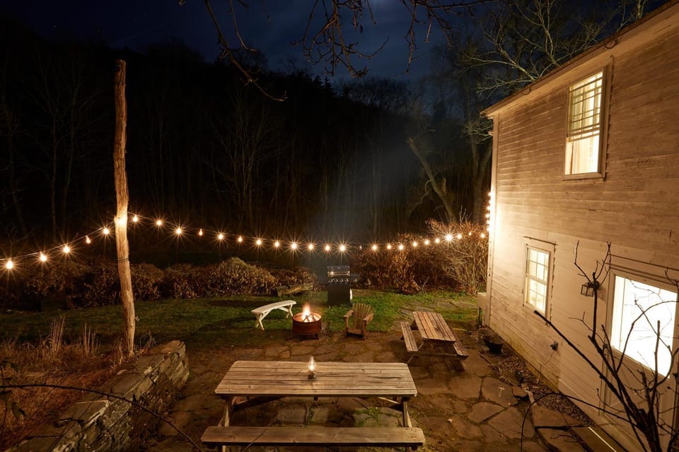 Property building, Patio, Night, BBQ facilities, Dining area, Garden view