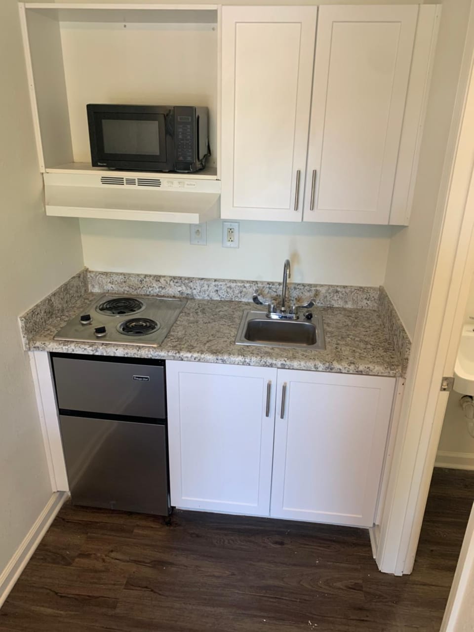 Kitchen or kitchenette, microwave