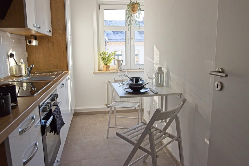 Dining area, dishwasher, stove, toaster, kitchen