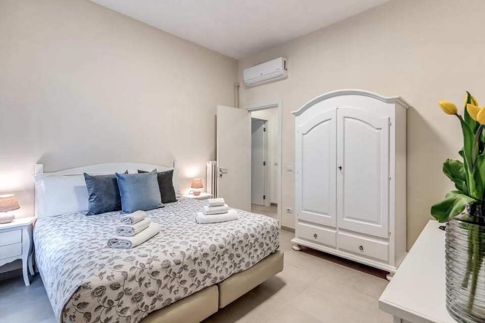 Bed, Photo of the whole room, Bedroom, towels, wardrobe, air conditioner