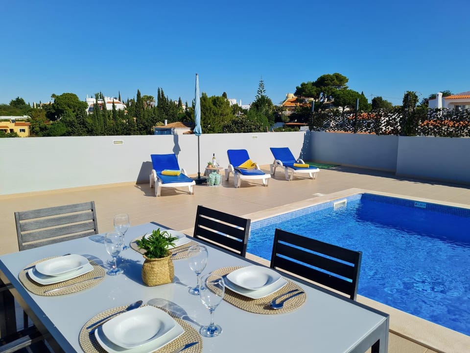 Patio, Day, Dining area, Pool view, Swimming pool, sunbed
