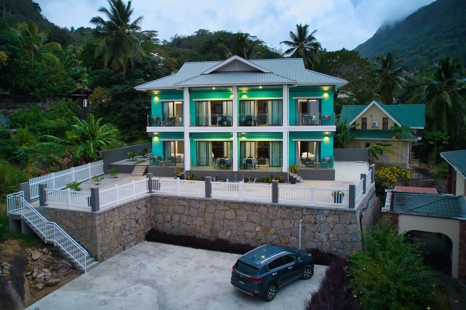 Property building, Natural landscape, Mountain view, Parking