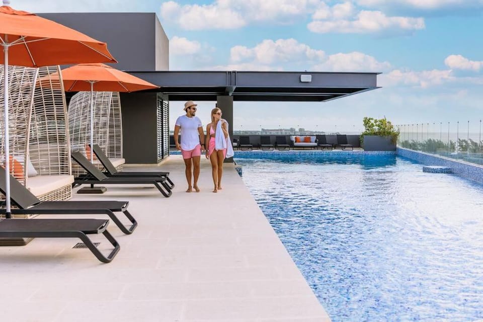 Patio, Day, People, Balcony/Terrace, Guests, Pool view, Swimming pool, Swimming pool, group of guests, sunbed